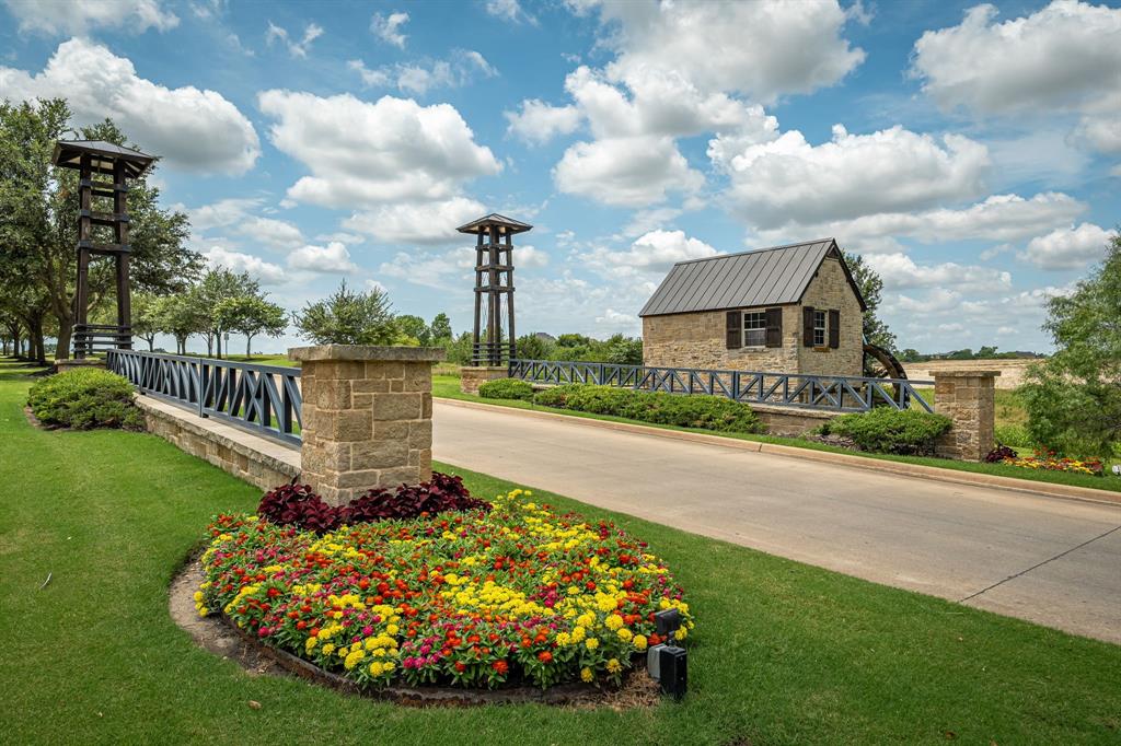 1412 Bear Path Way Gunter, TX 75058 - Photo 34 of 37 a front view of a house with garden
