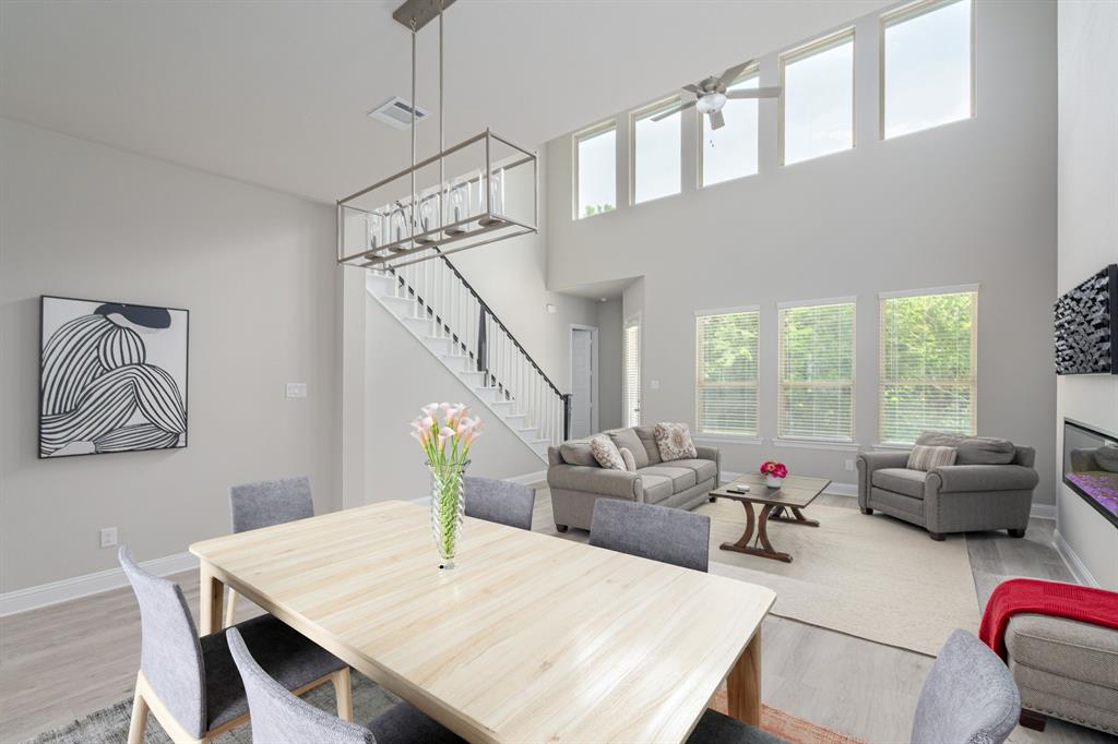 1412 Bear Path Way Gunter, TX 75058 - Photo 9 of 37 a living room with furniture and a large window