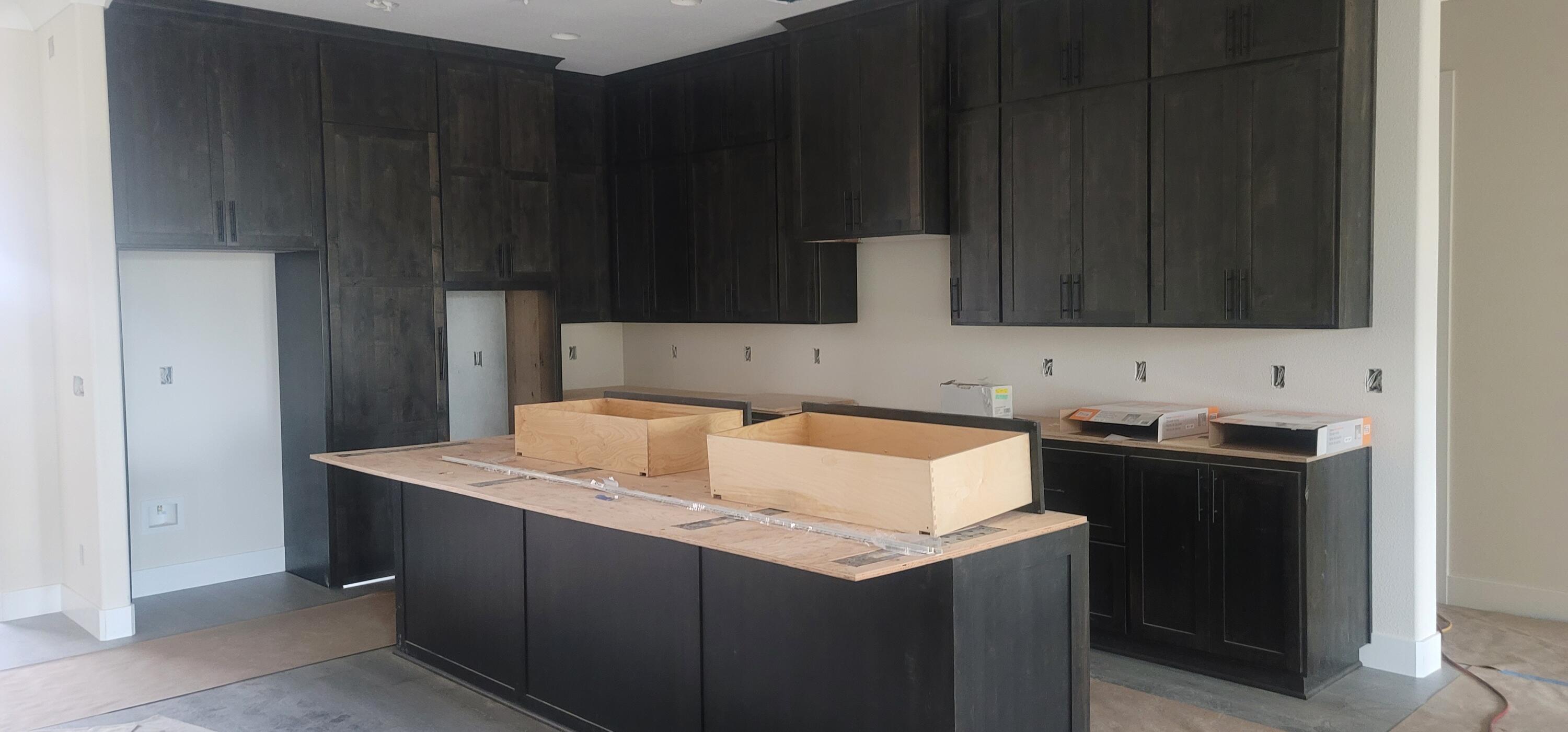 910 Santa Cruz Drive Redding, CA 96003 - Photo 27 of 28 a kitchen with granite countertop a refrigerator stove and sink