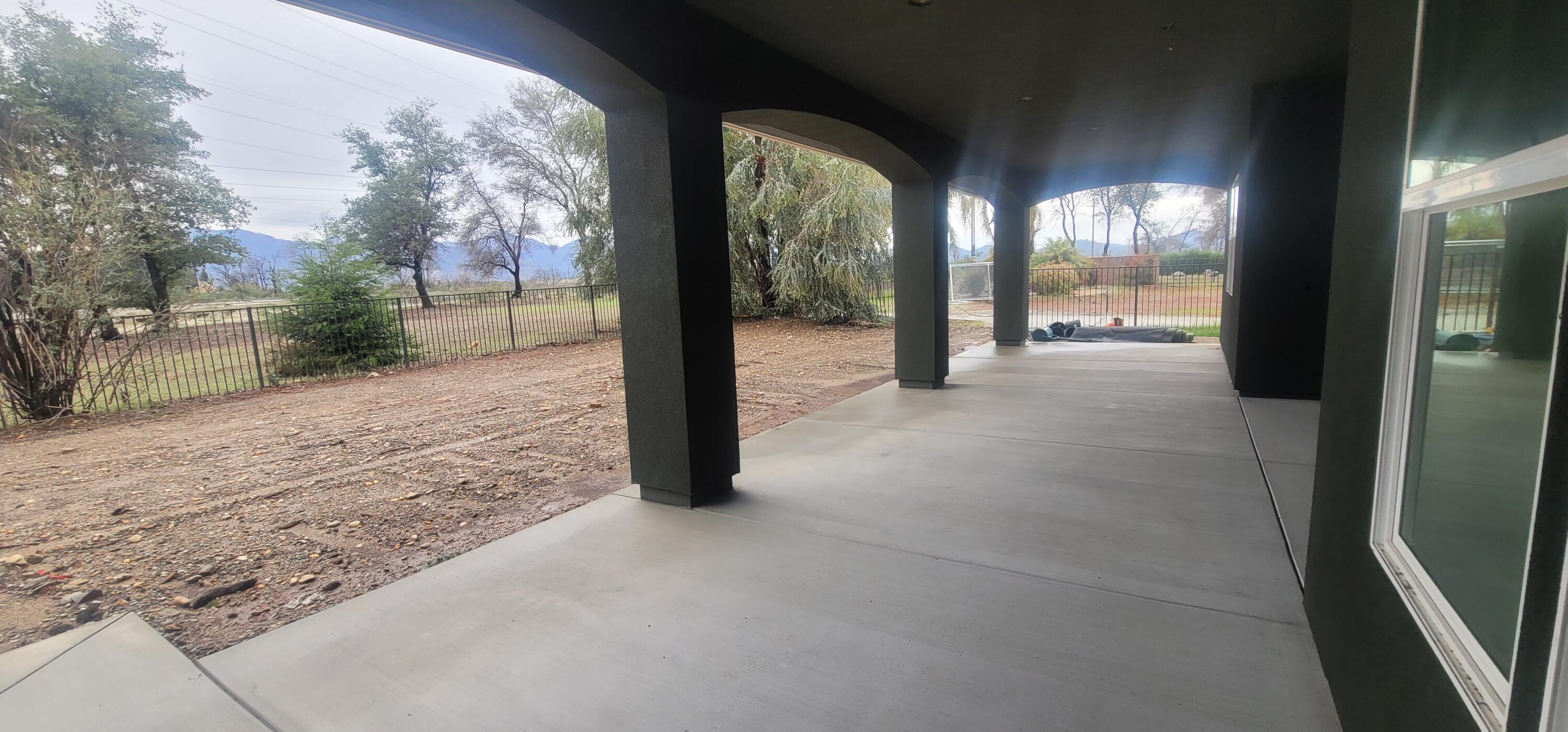 910 Santa Cruz Drive Redding, CA 96003 - Photo 3 of 28 a view of a porch with a tree