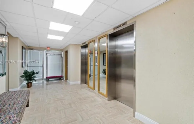 a view of hallway with livingroom