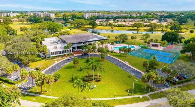 a view of a swimming pool with a garden