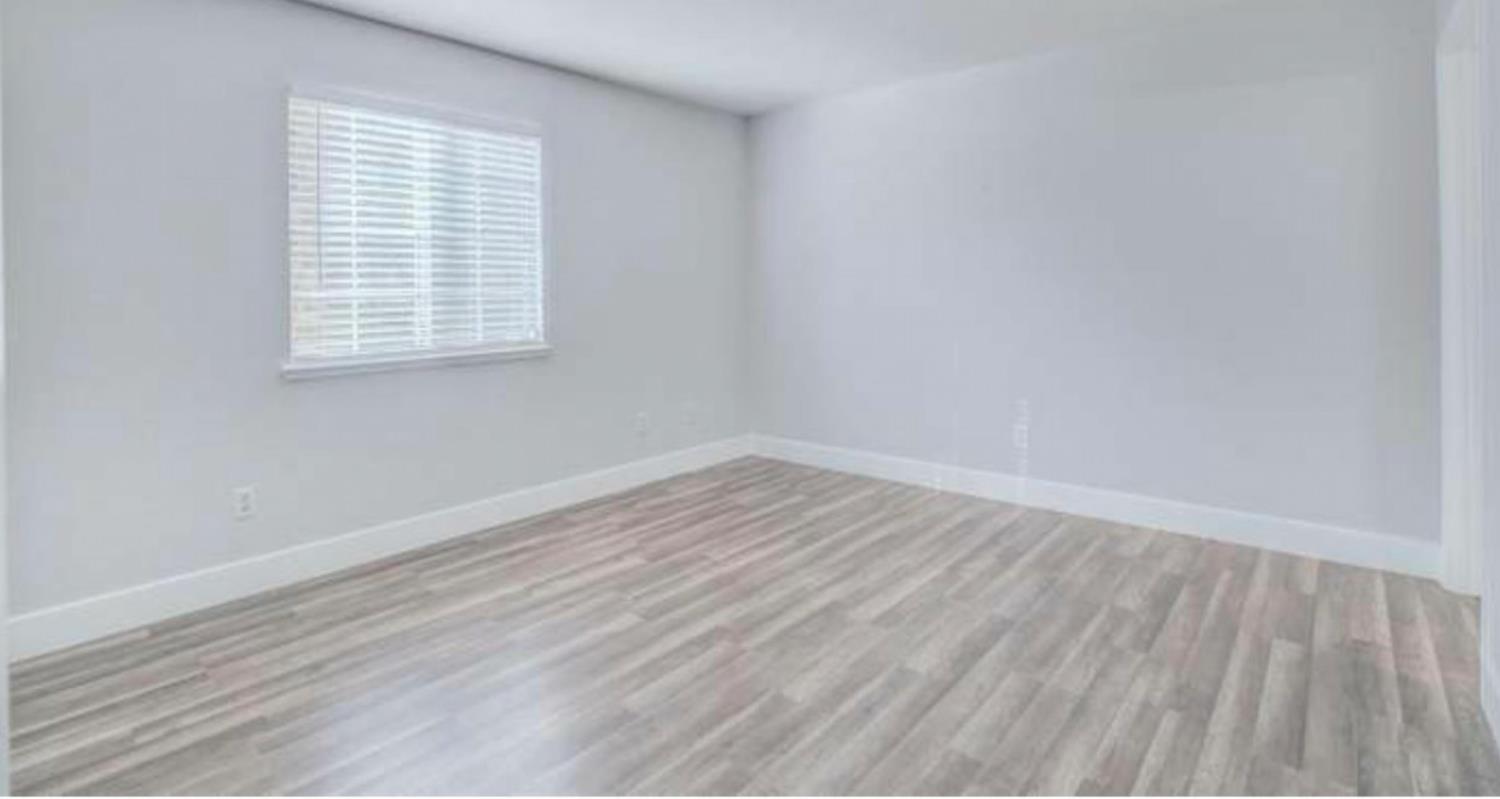 8020 Walerga Road, Unit 1147 Antelope, CA 95843 - Photo 12 of 20 wooden floor in an empty room with a window