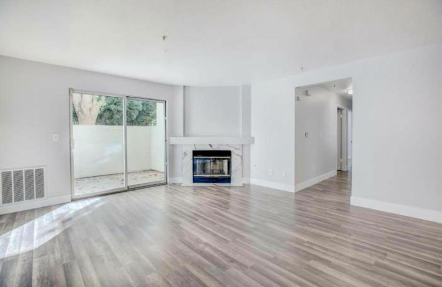 8020 Walerga Road, Unit 1147 Antelope, CA 95843 - Photo 2 of 20 an empty room with wooden floor and windows