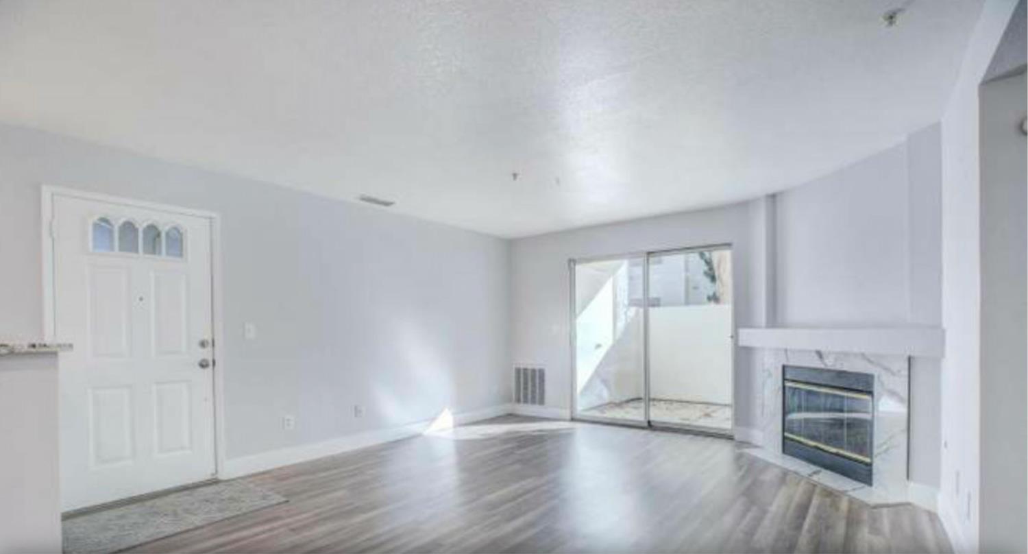 8020 Walerga Road, Unit 1147 Antelope, CA 95843 - Photo 7 of 20 a view of empty room with wooden floor and fan