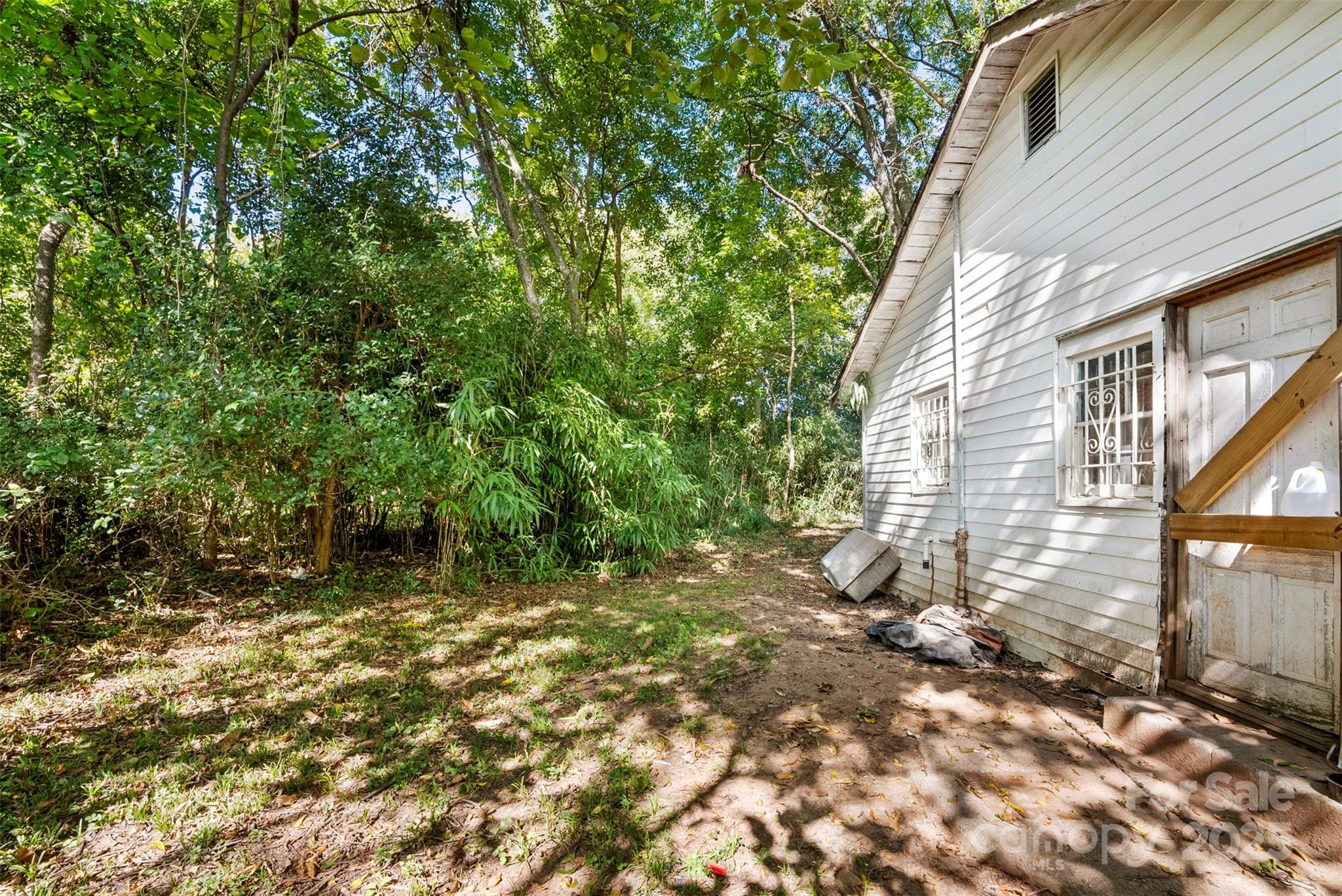 3444 Marvin Road Charlotte, NC 28211 - Photo 13 of 34 a backyard of a house with lots of green space