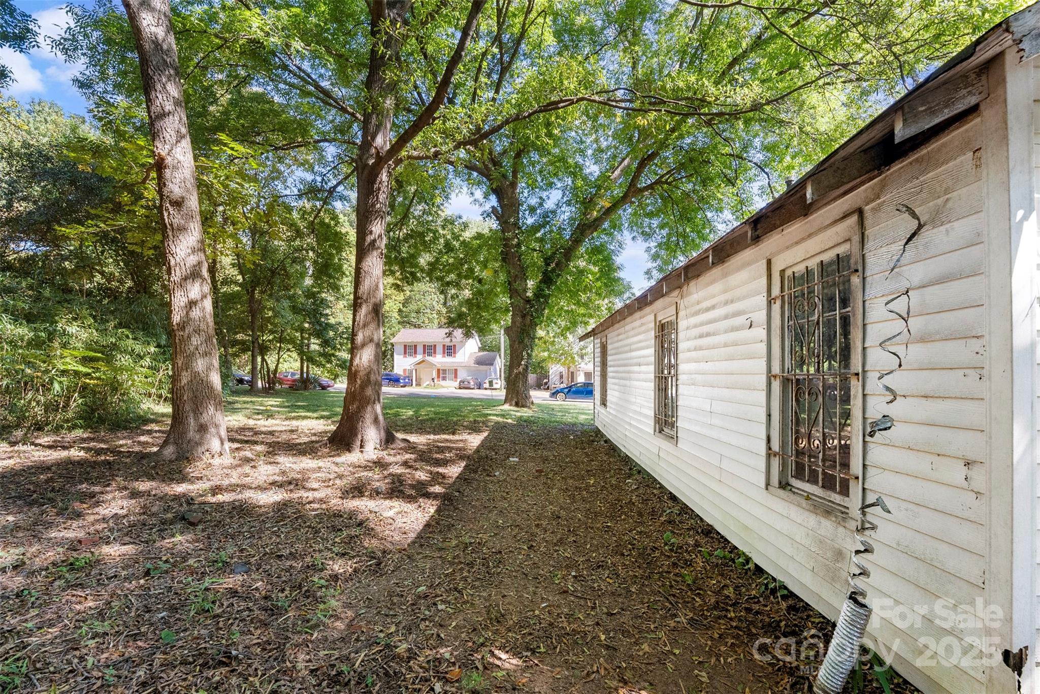 3444 Marvin Road Charlotte, NC 28211 - Photo 15 of 34 a backyard of a house with lots of green space