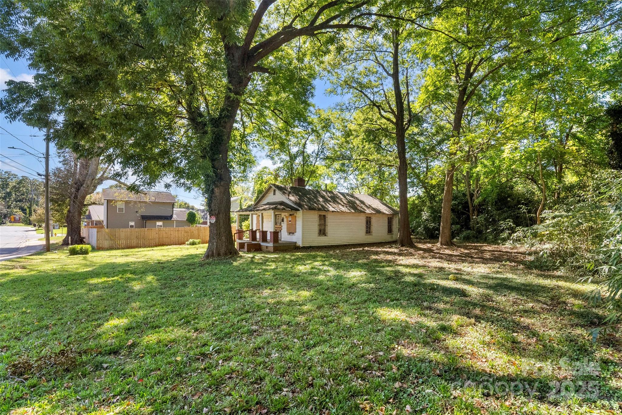 3444 Marvin Road Charlotte, NC 28211 - Photo 19 of 34 a house with trees in front of it