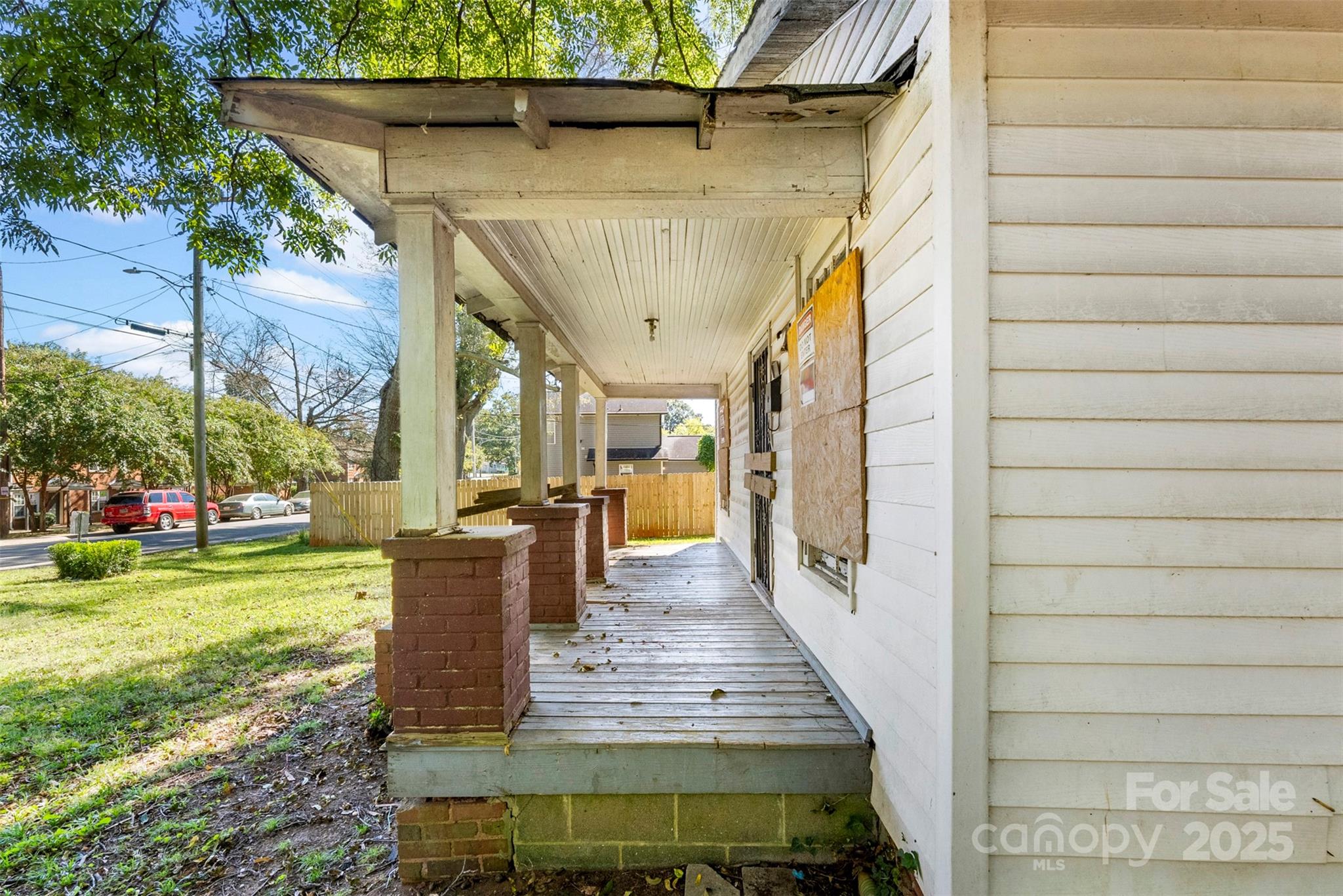 3444 Marvin Road Charlotte, NC 28211 - Photo 23 of 34 a view of a patio with table and chairs with wooden fence