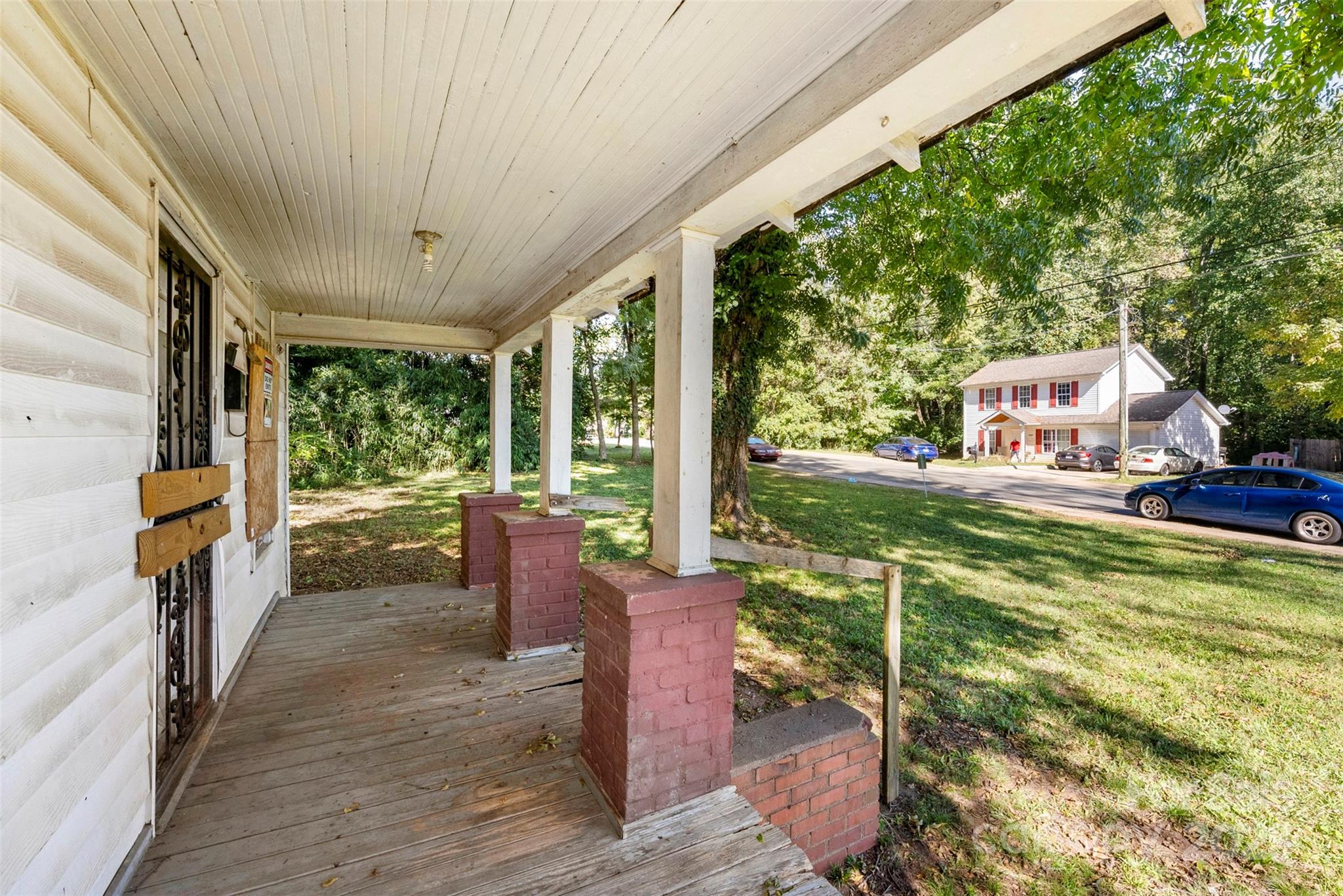 3444 Marvin Road Charlotte, NC 28211 - Photo 26 of 34 a view of a porch with furniture and garden