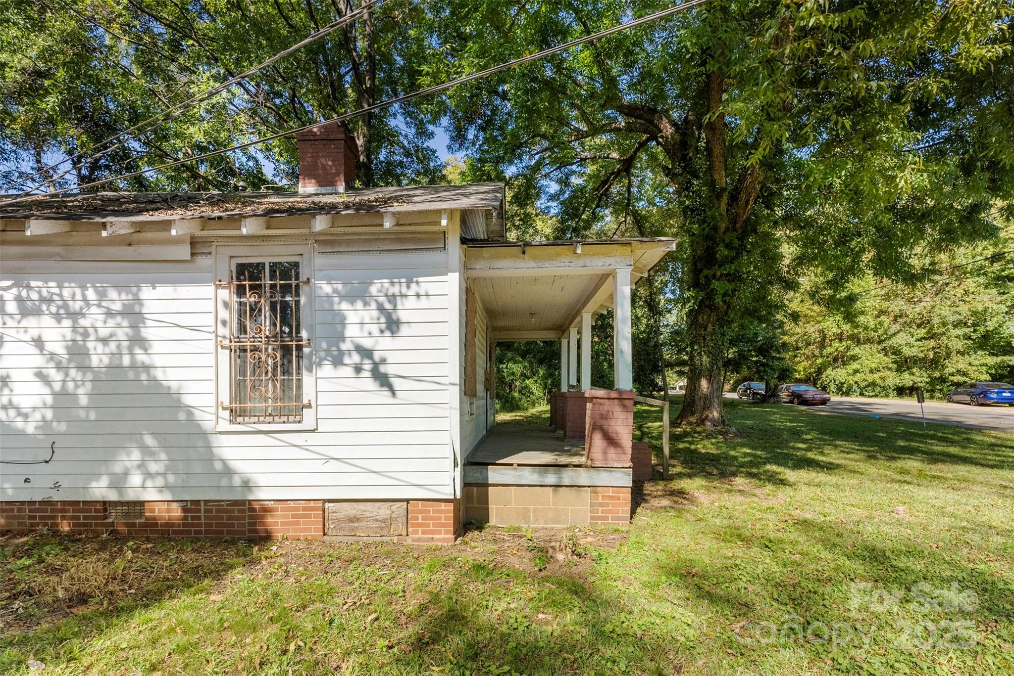 3444 Marvin Road Charlotte, NC 28211 - Photo 7 of 34 a view of a house with backyard and sitting area