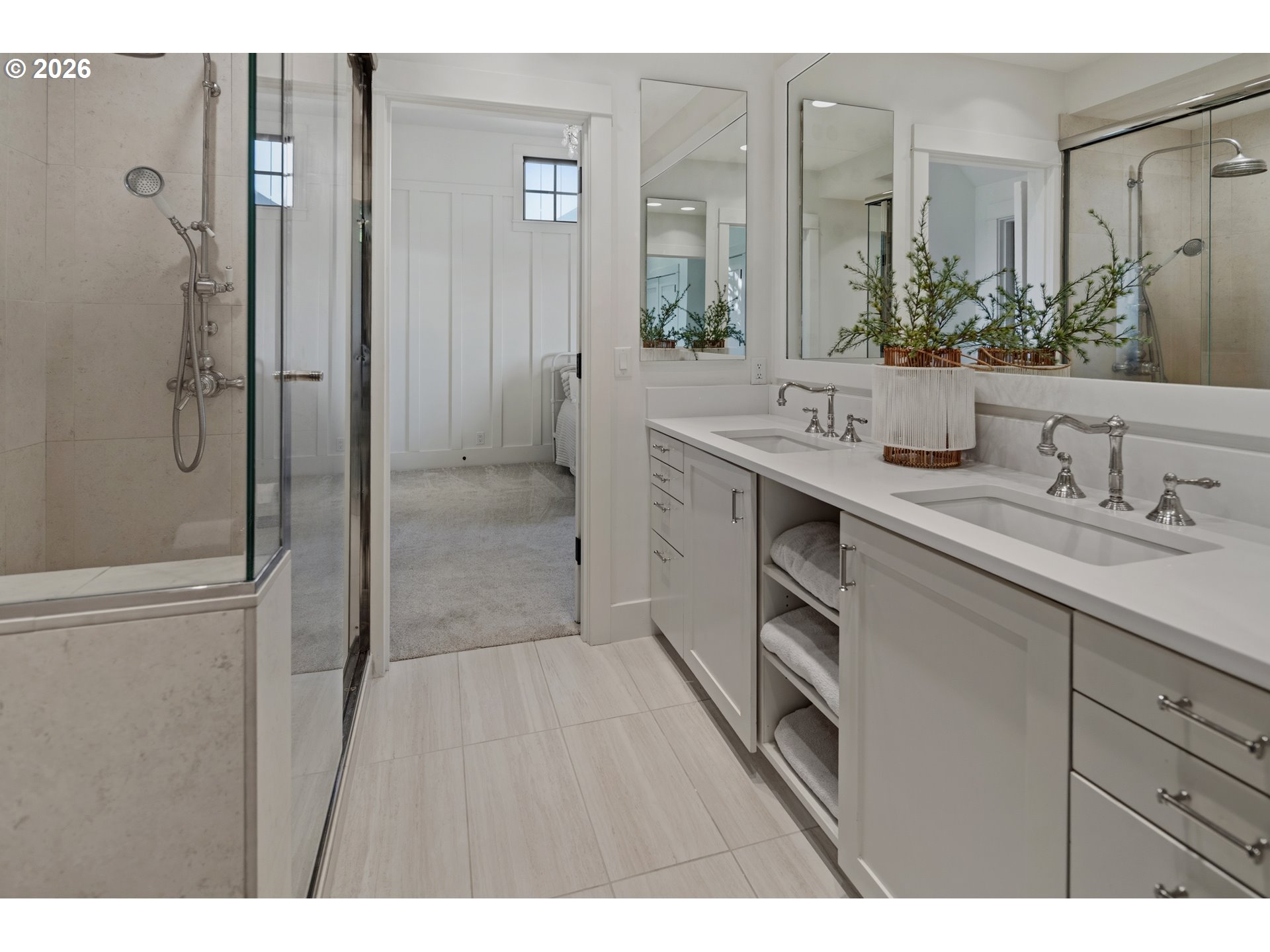 554 Northwest Dawson Ridge Drive Camas, WA 98607 - Photo 24 of 48 a bathroom with a double vanity sink a mirror and a shower