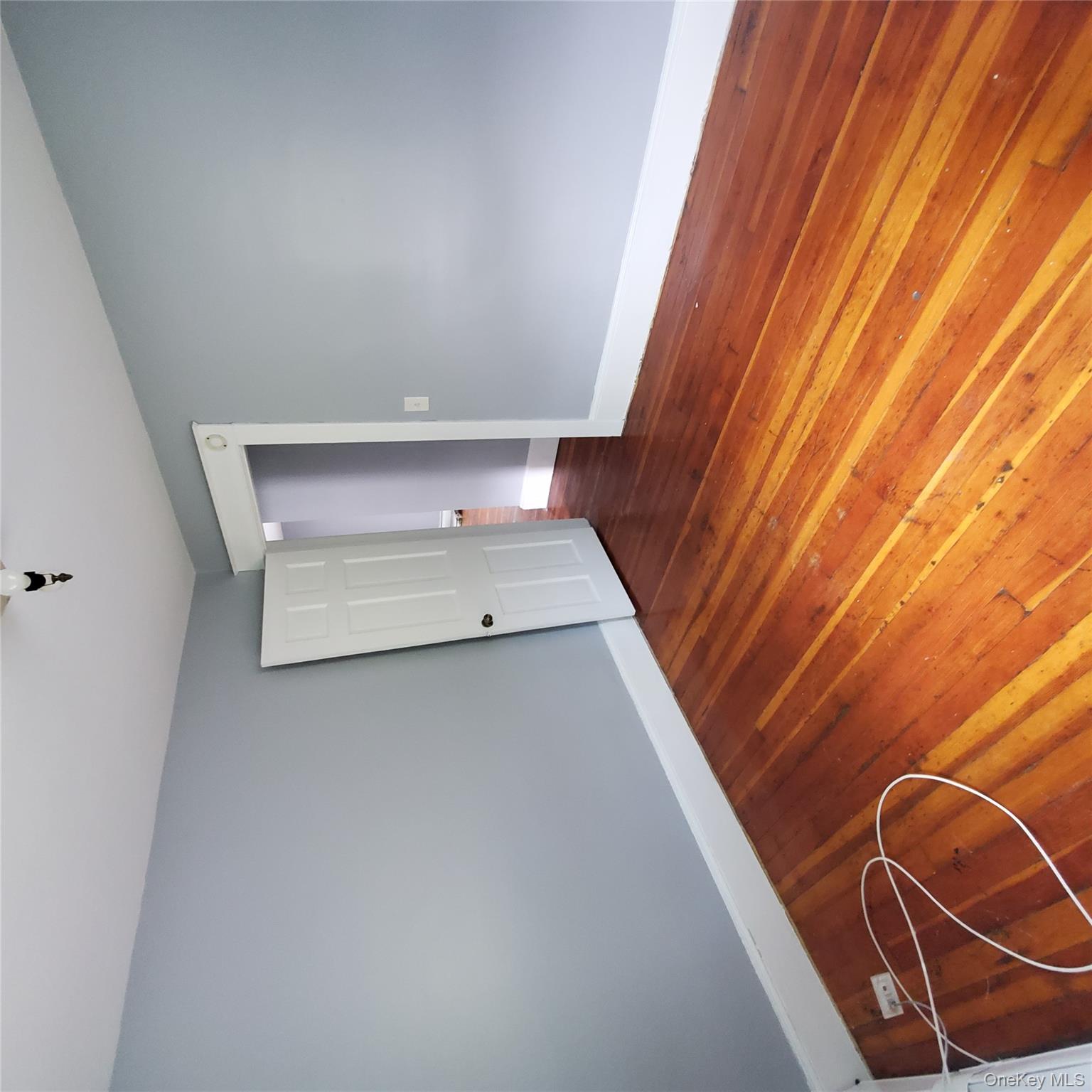 210 Smith Street Poughkeepsie, NY 12601 - Photo 28 of 44 a view of room with wooden floor