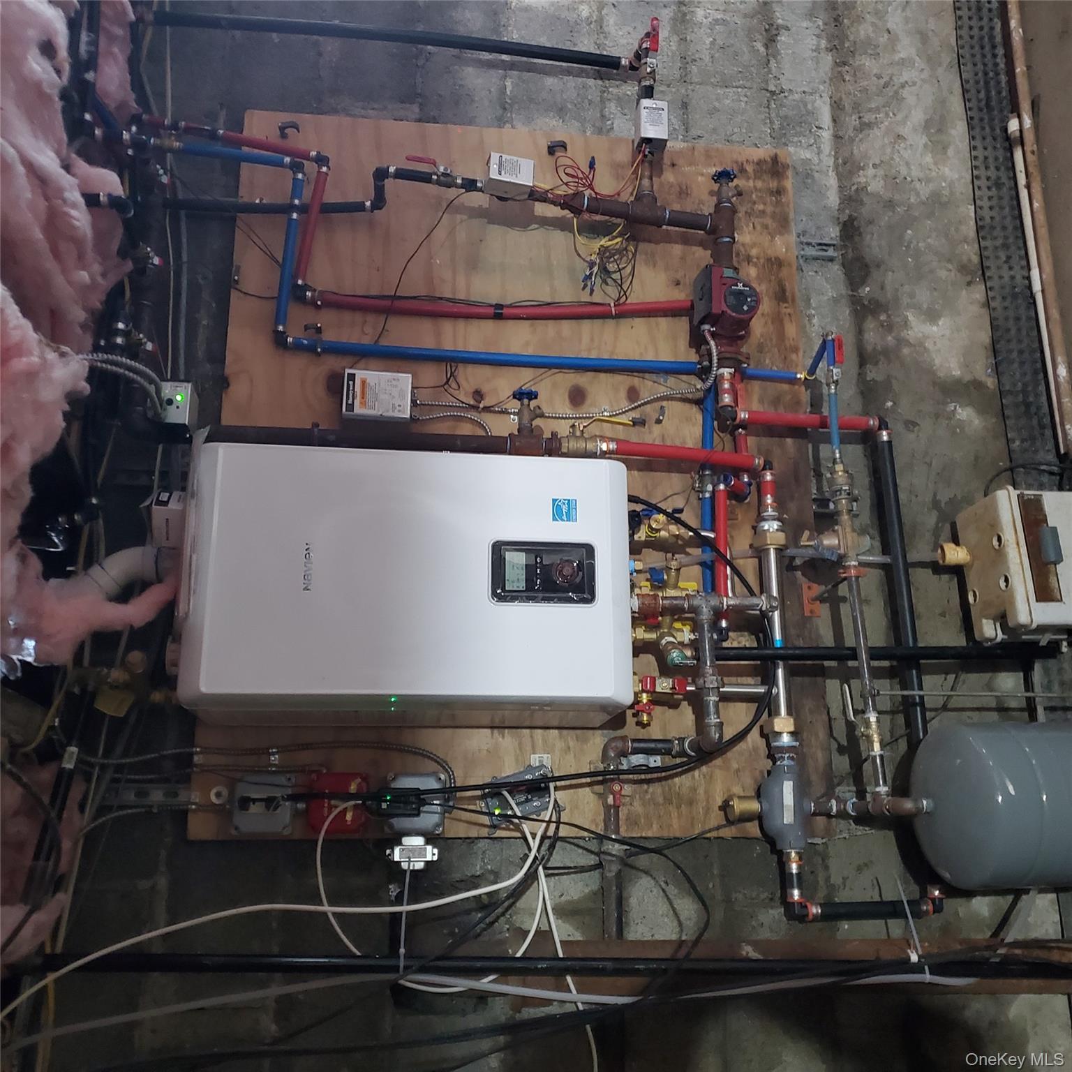 210 Smith Street Poughkeepsie, NY 12601 - Photo 33 of 44 Utility room with water heater