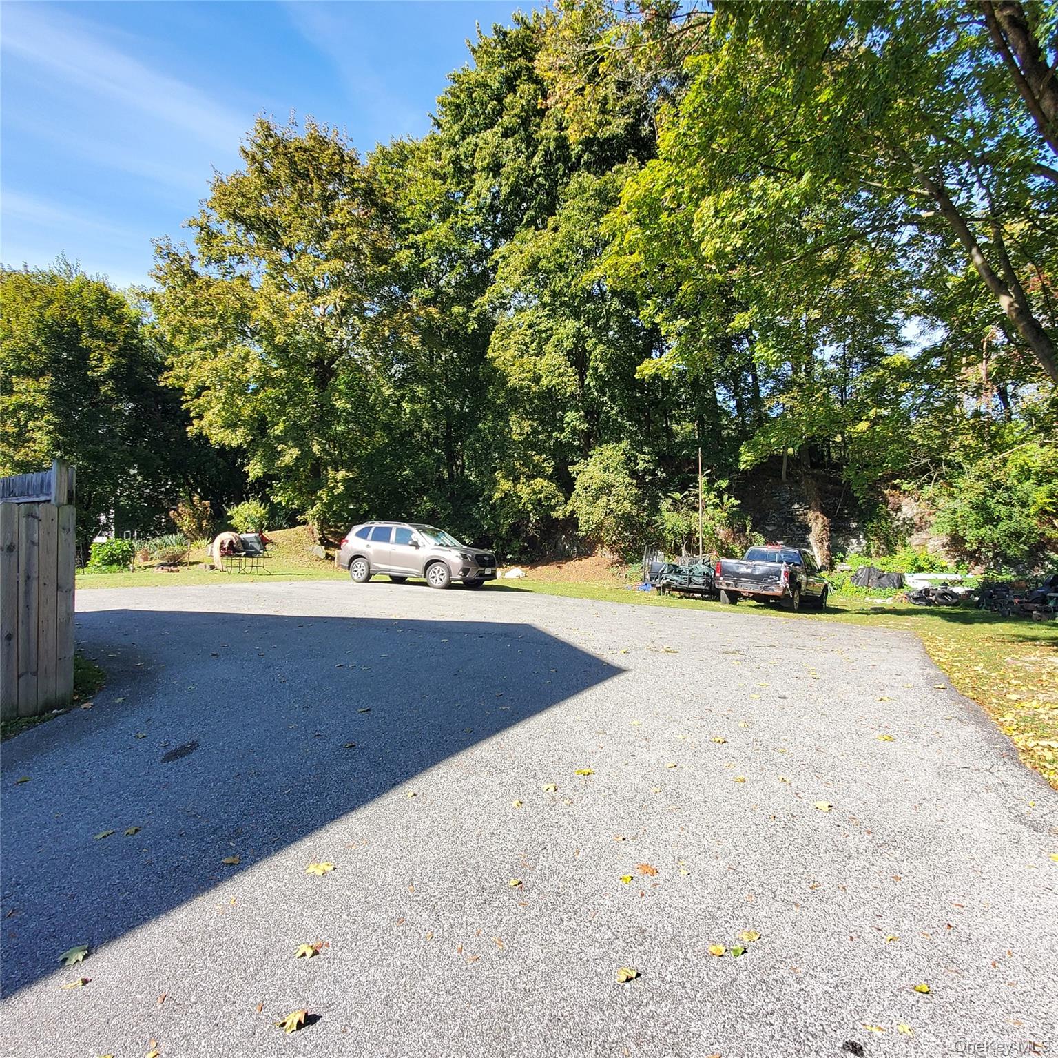 210 Smith Street Poughkeepsie, NY 12601 - Photo 36 of 44 a view of yard with swimming pool and trees