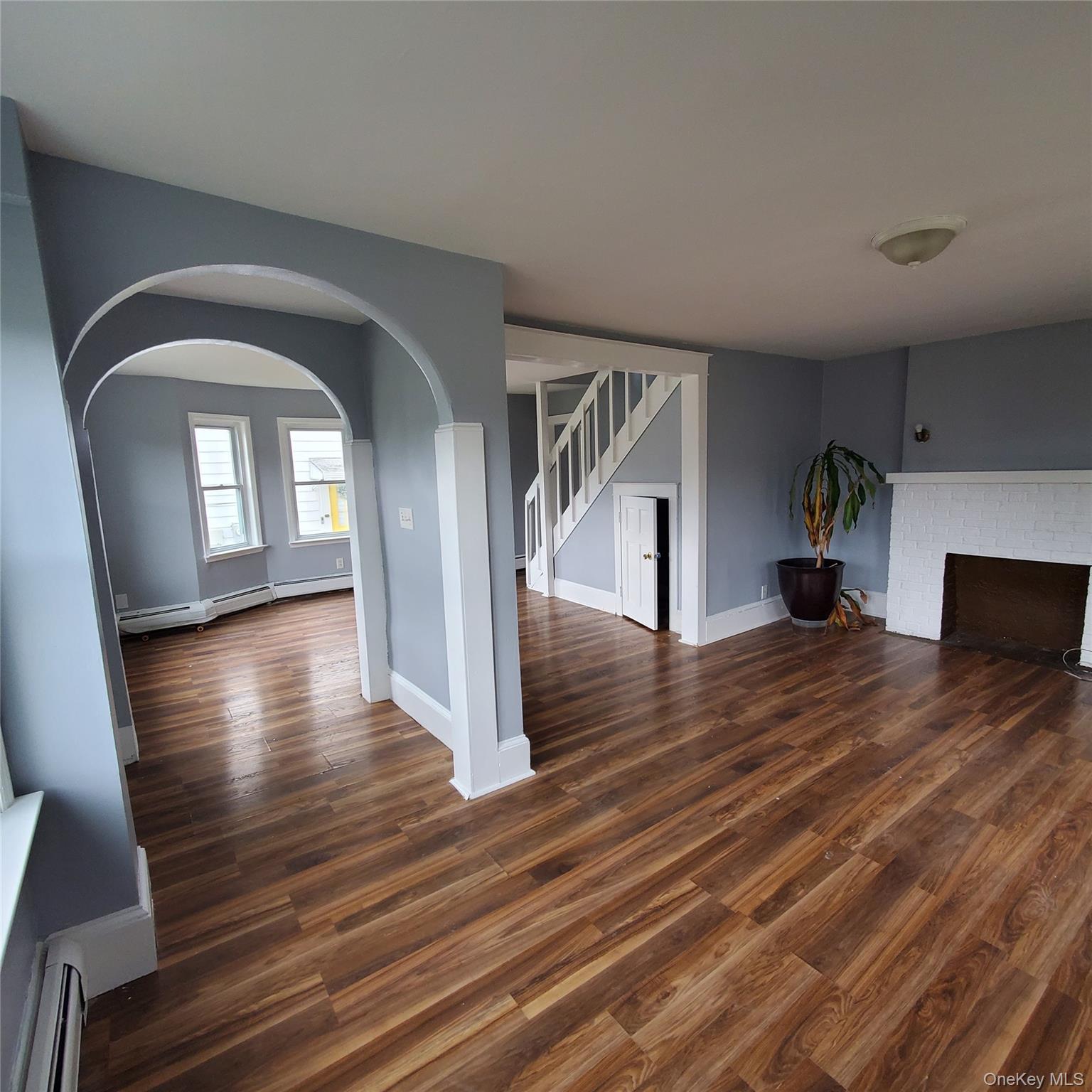 210 Smith Street Poughkeepsie, NY 12601 - Photo 5 of 44 a view of livingroom and hardwood floor