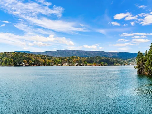 a view of an ocean and a mountain