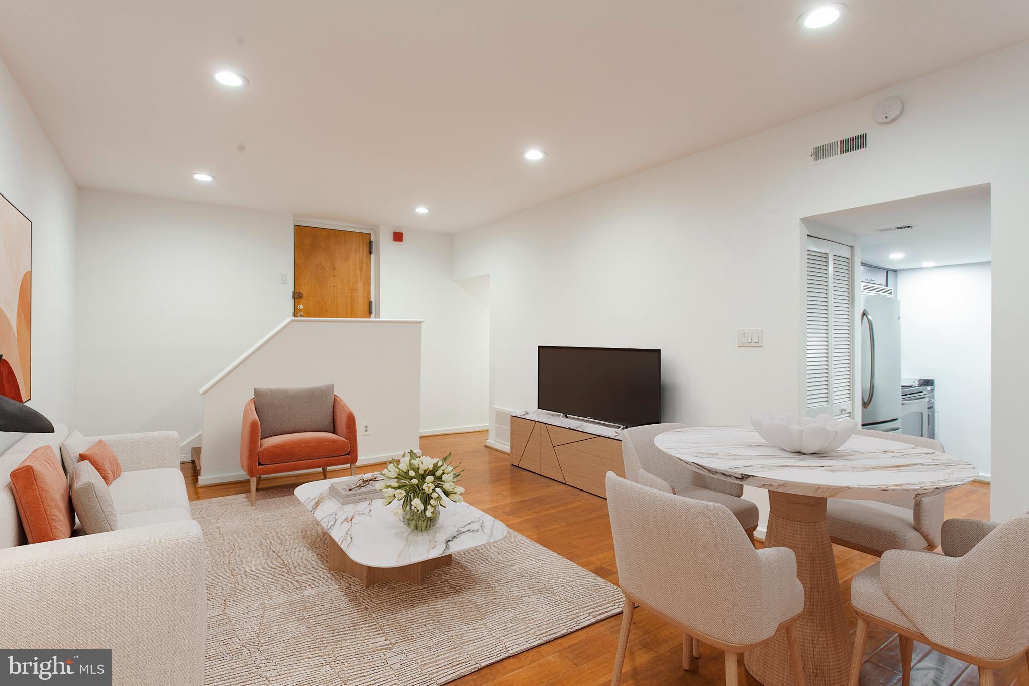 1035 Spruce Street, Unit 106 Philadelphia, PA 19107 - Photo 9 of 27 Dining/Living (virtually staged)