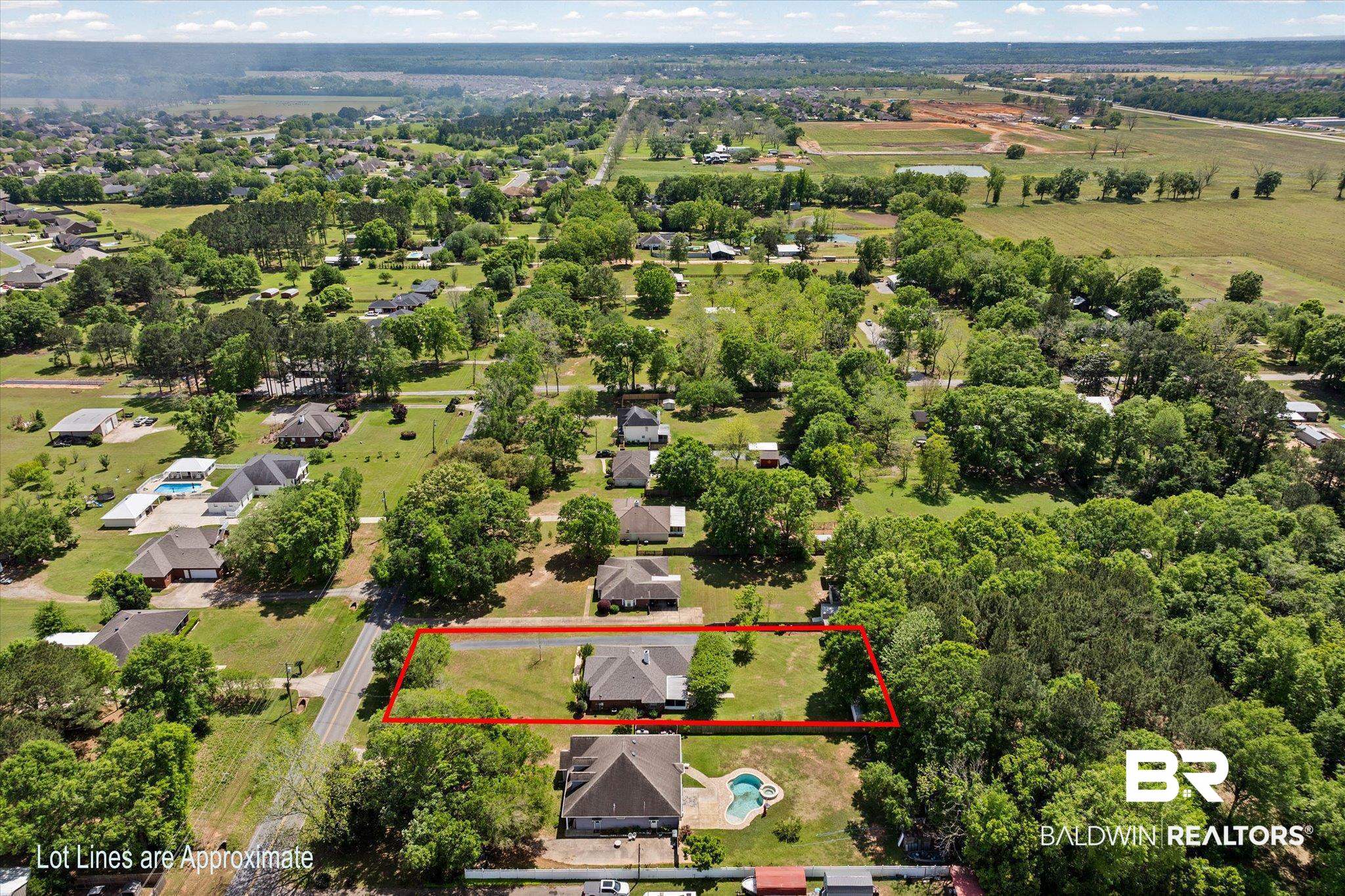 25825 Austin Road Daphne, AL 36526 - Photo 27 of 30 Aerial perspective of suburban area with property parcel outlined