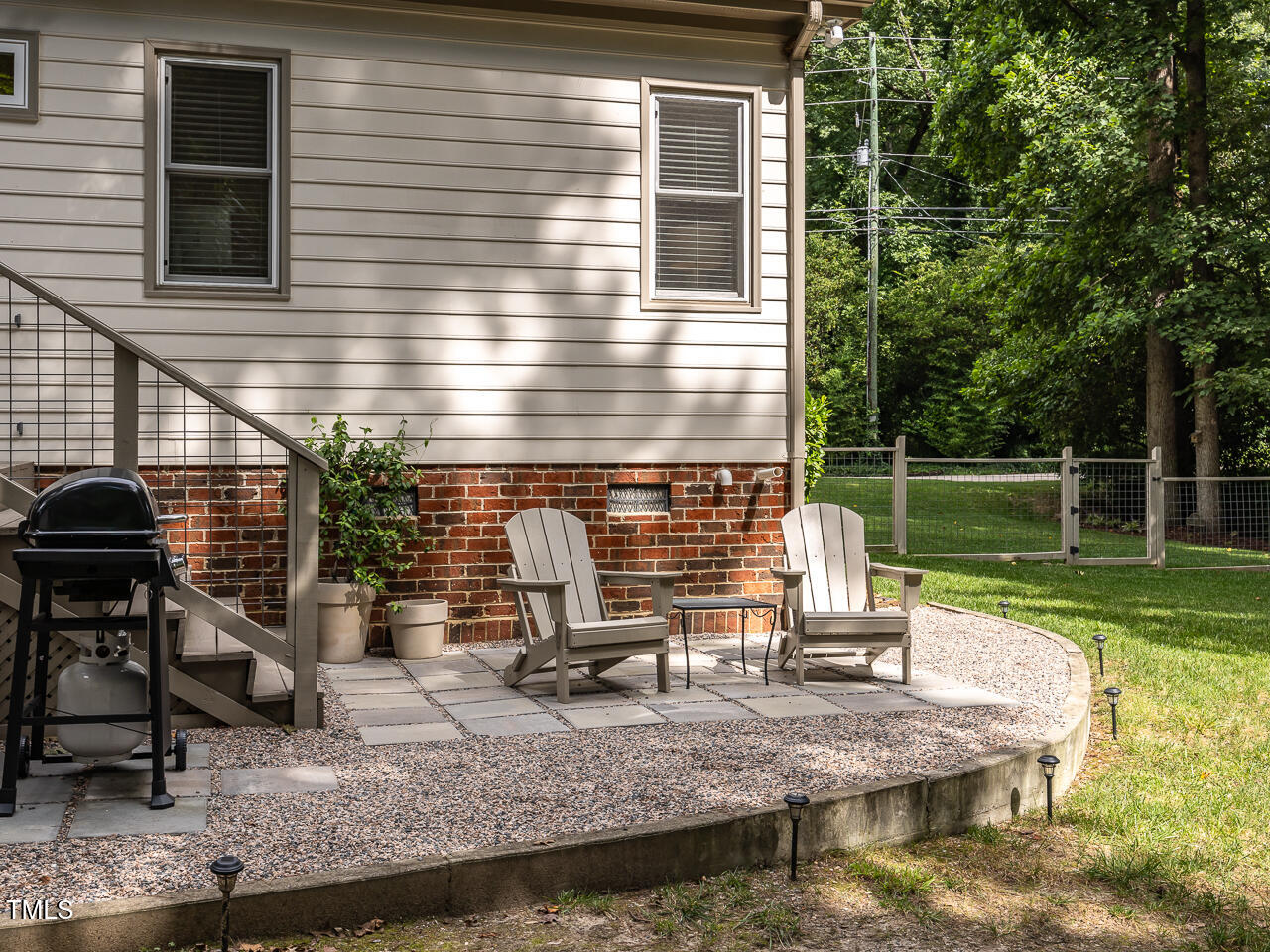 104 Pinecroft Drive Raleigh, NC 27609 - Photo 27 of 33 a view of house with a back yard
