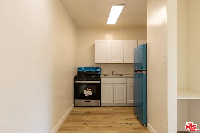a view of kitchen and utility room