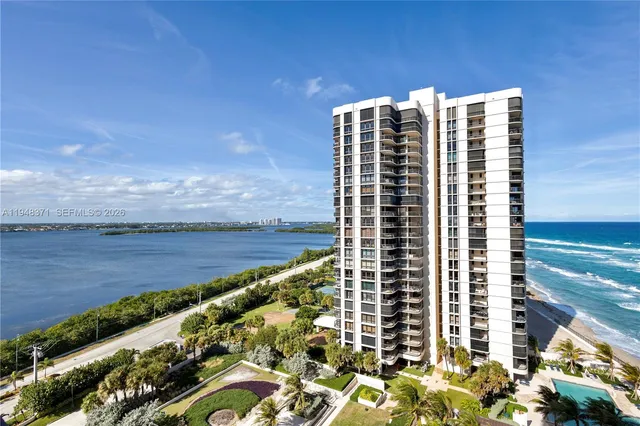 a view of a building with a yard