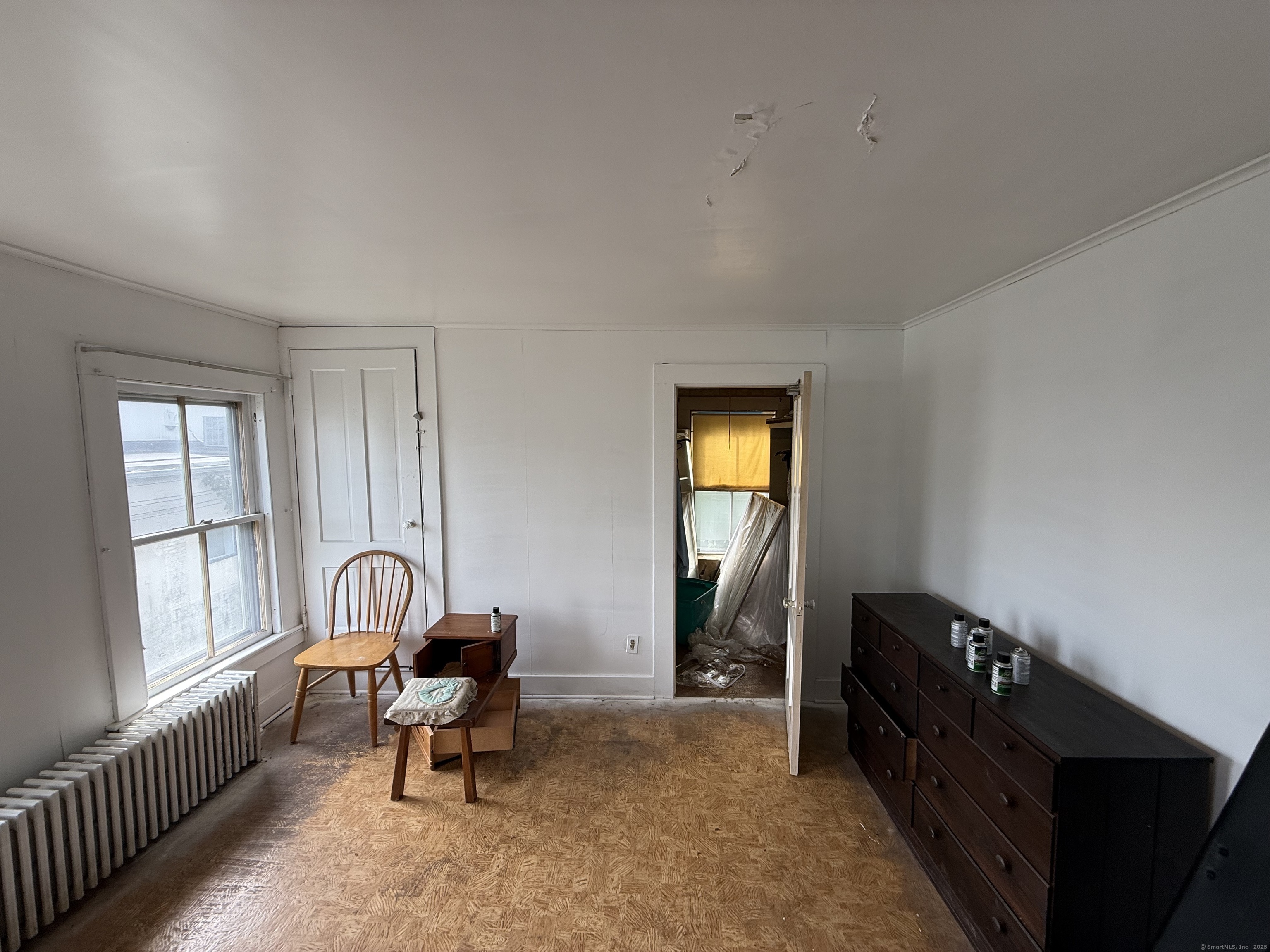 60 Capitol Avenue Meriden, CT 06451 - Photo 10 of 10 a living room with furniture and a window
