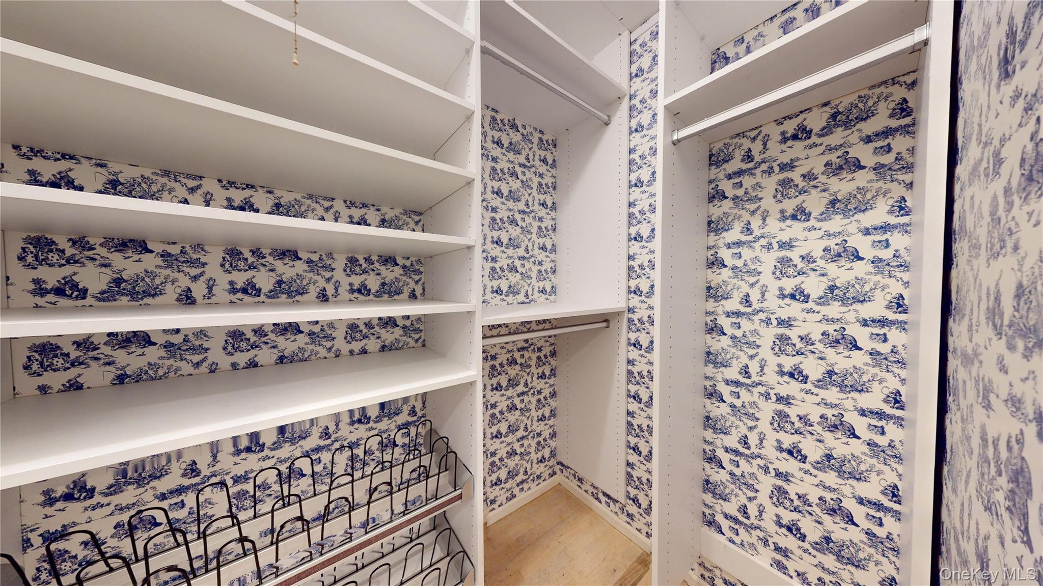 40 Nidzyn Avenue Remsenburg, NY 11960 - Photo 16 of 28 Walk in closet with light wood-style flooring