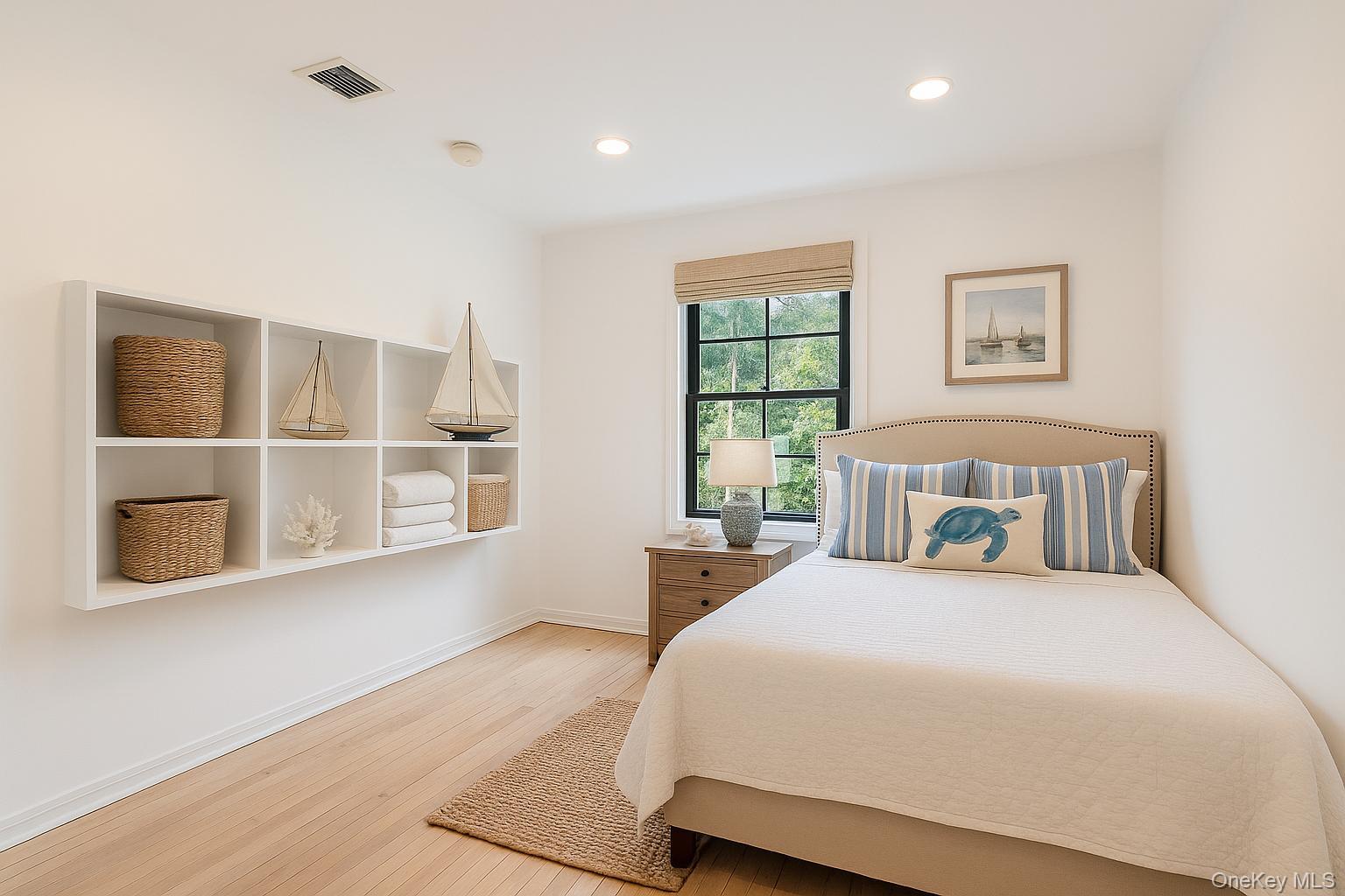 40 Nidzyn Avenue Remsenburg, NY 11960 - Photo 19 of 28 Bedroom featuring light wood finished floors and recessed lighting
