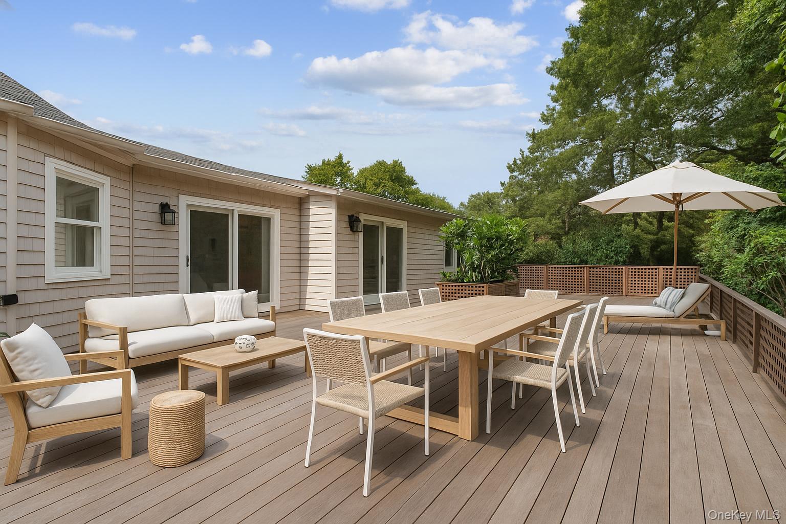 40 Nidzyn Avenue Remsenburg, NY 11960 - Photo 24 of 28 Deck with outdoor dining area and an outdoor living space