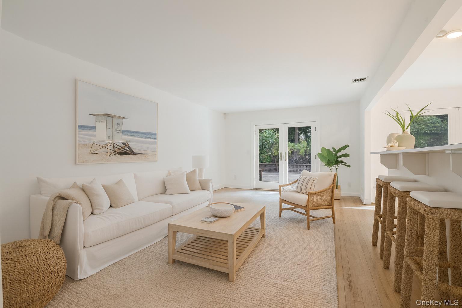 40 Nidzyn Avenue Remsenburg, NY 11960 - Photo 5 of 28 Living area with light wood finished floors