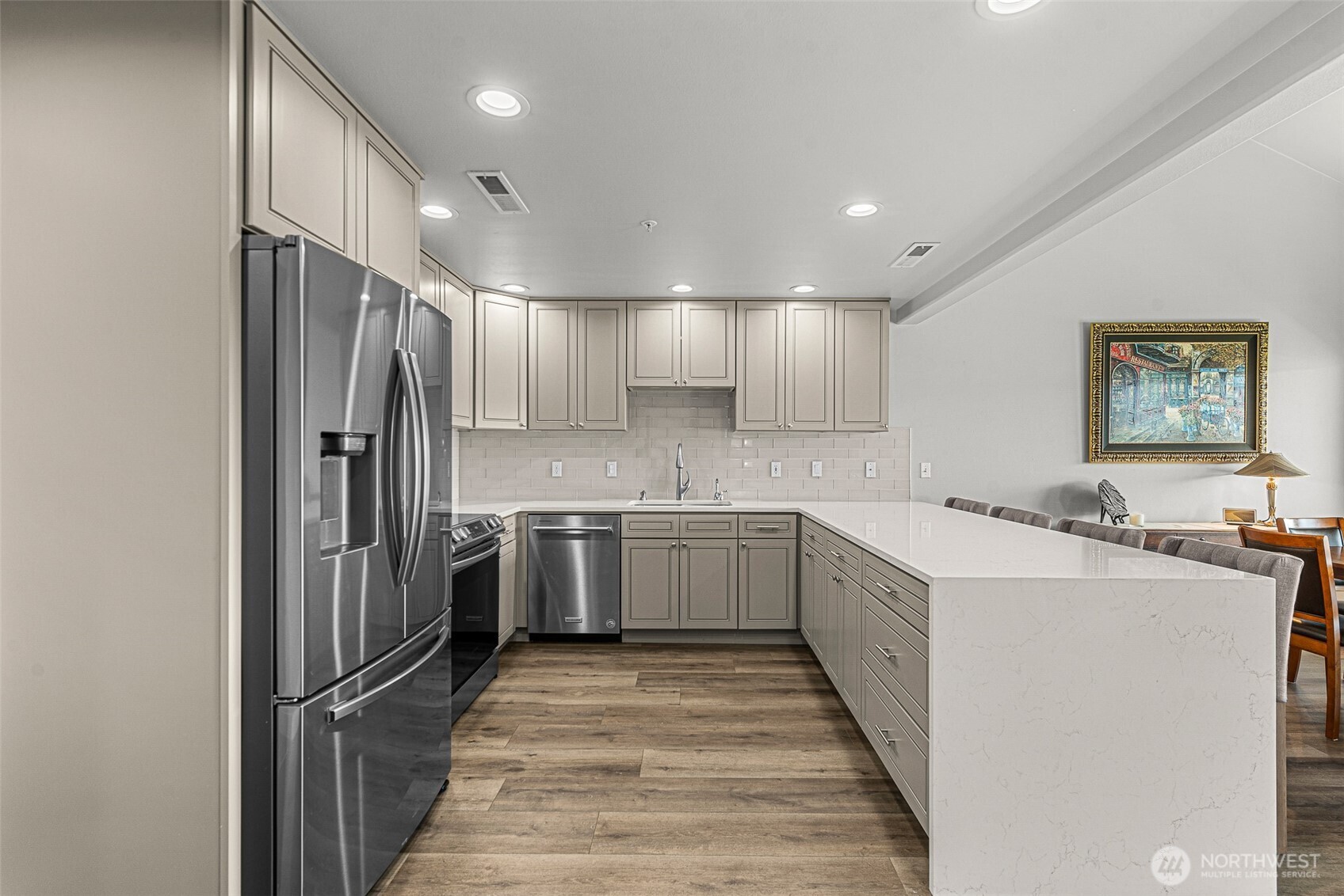 8997 Crescent Bar Road Northwest, Unit 219 Quincy, WA 98848 - Photo 13 of 40 a view of a kitchen with a sink refrigerator and window
