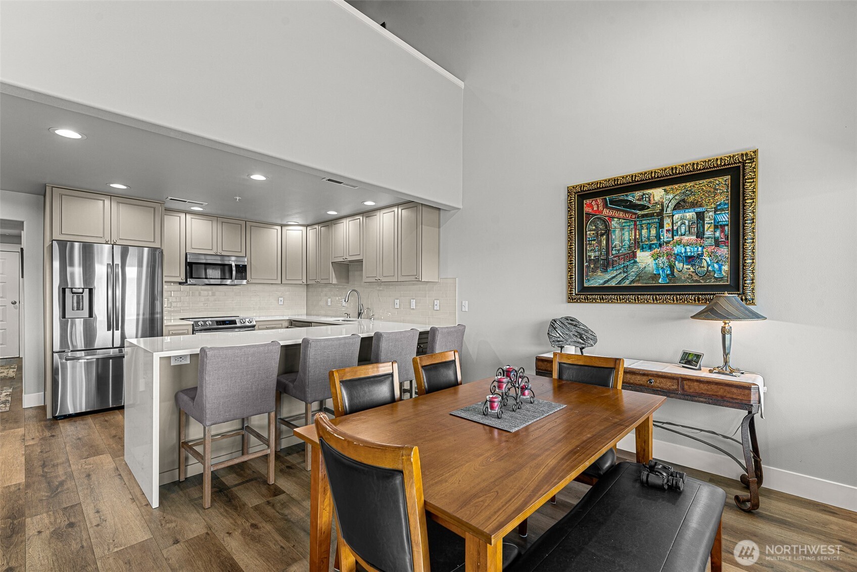8997 Crescent Bar Road Northwest, Unit 219 Quincy, WA 98848 - Photo 14 of 40 a living room with stainless steel appliances kitchen island granite countertop furniture and a dining table