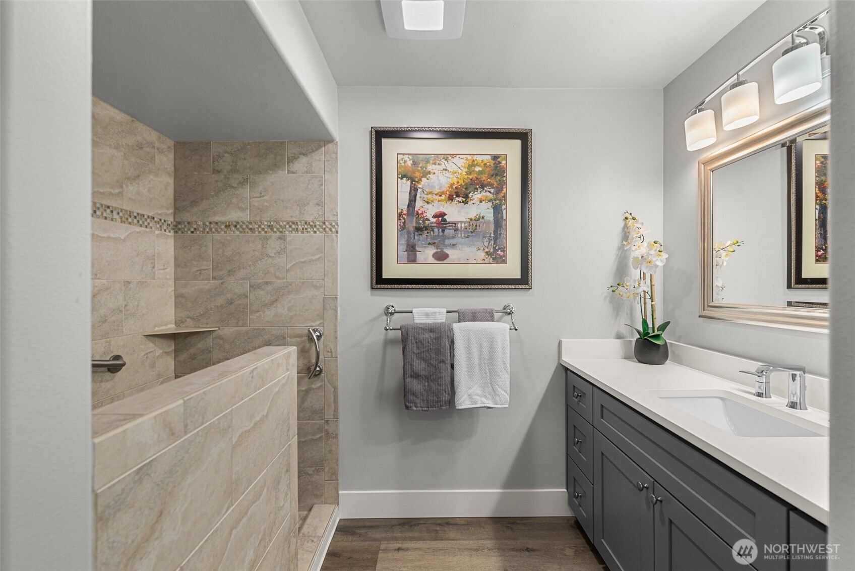 8997 Crescent Bar Road Northwest, Unit 219 Quincy, WA 98848 - Photo 26 of 40 a bathroom with a sink a toilet and mirror
