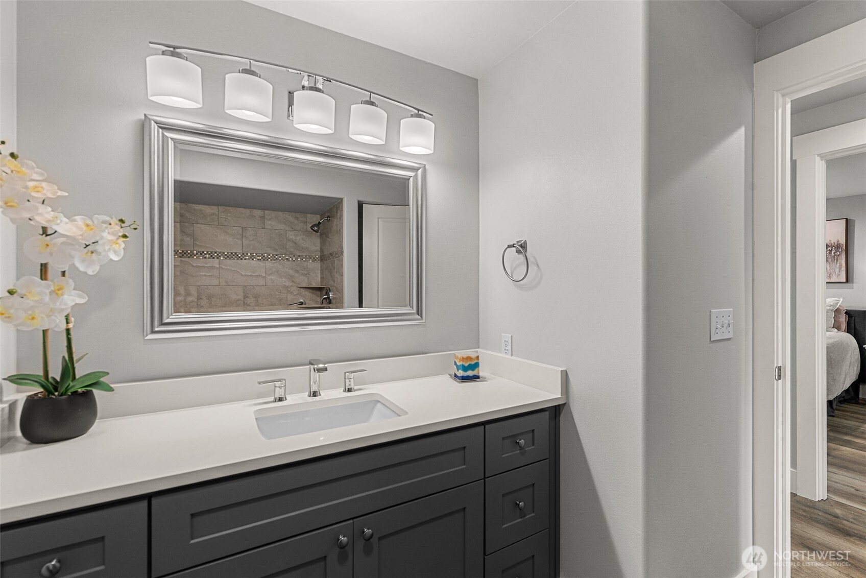 8997 Crescent Bar Road Northwest, Unit 219 Quincy, WA 98848 - Photo 27 of 40 a bathroom with a sink and a mirror