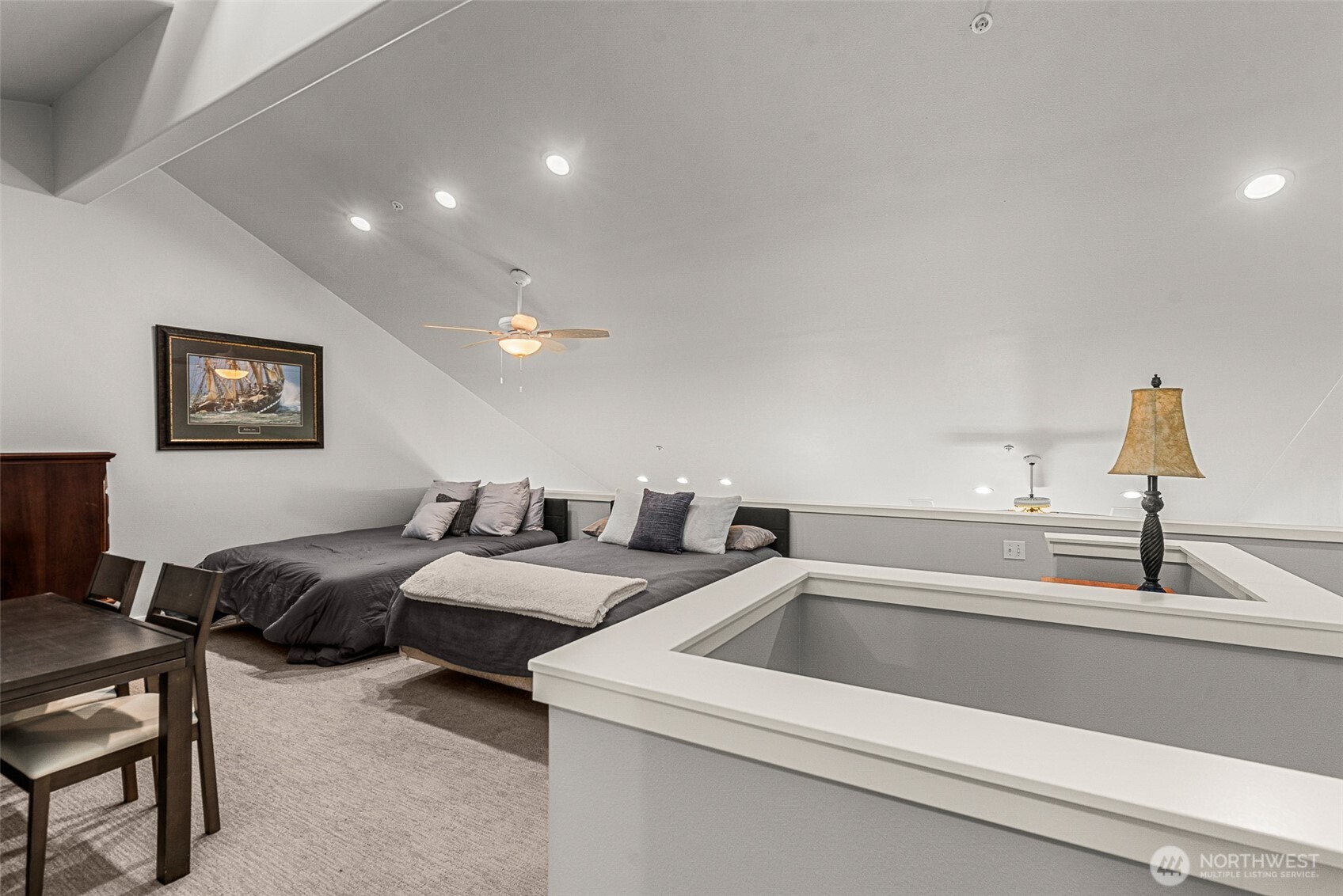 8997 Crescent Bar Road Northwest, Unit 219 Quincy, WA 98848 - Photo 28 of 40 a kitchen with a sink and a mirror