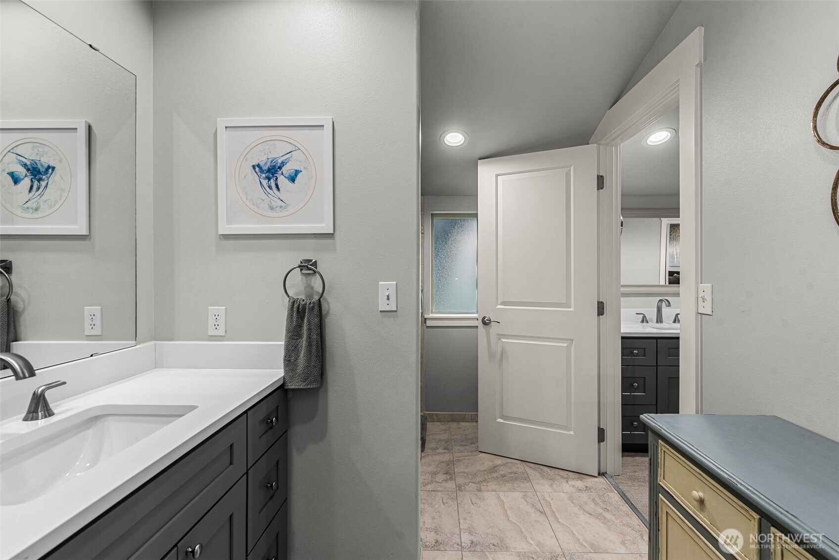 8997 Crescent Bar Road Northwest, Unit 219 Quincy, WA 98848 - Photo 33 of 40 a view of a kitchen with a sink and refrigerator