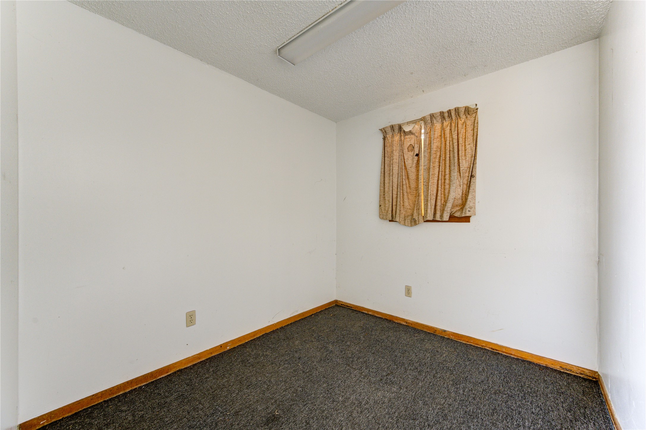 4602 Avenue H Rosenberg, TX 77471 - Photo 30 of 42 a view of an empty room with a window