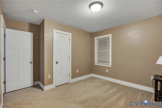 an empty room with windows