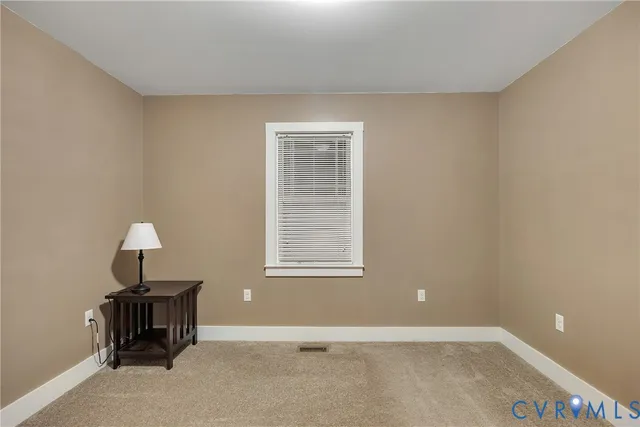 a view of a room with a workspace