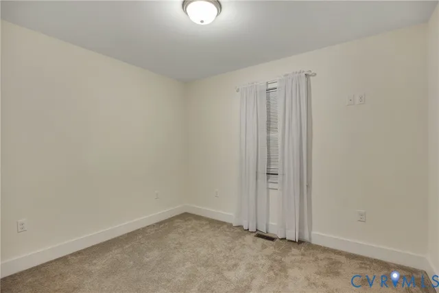 an empty room with a workbench