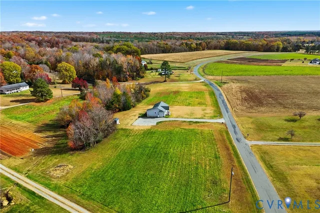 swimming pool view with a lake view