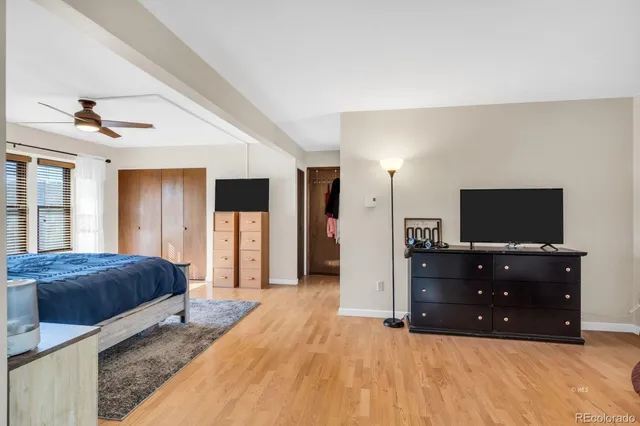 a living room with furniture and flat screen tv