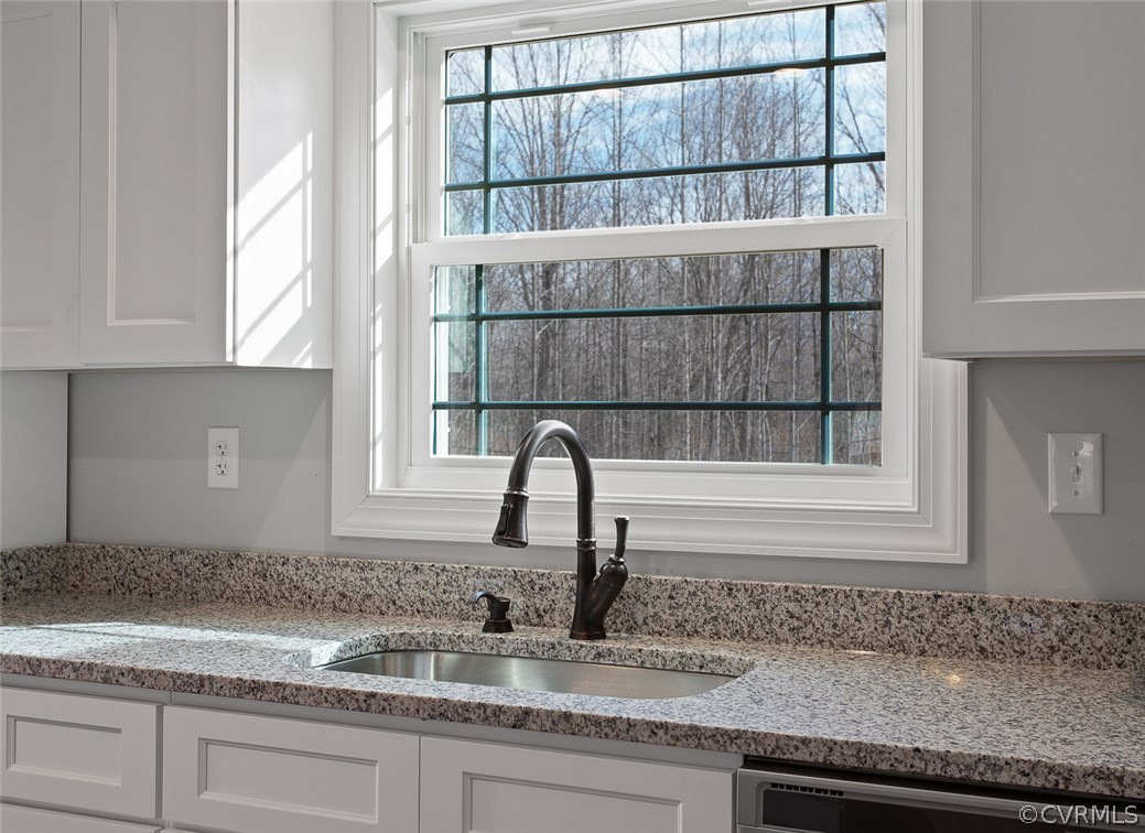 116 Diggstown Road Bumpass, VA 23024 - Photo 8 of 20 a kitchen with a sink and a window