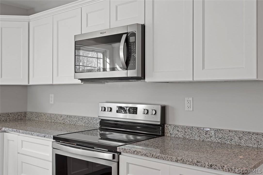 116 Diggstown Road Bumpass, VA 23024 - Photo 9 of 20 a stove top oven sitting inside of a kitchen