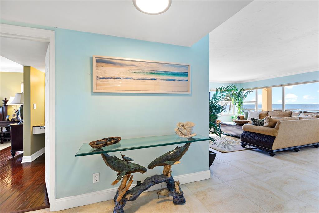603 Longboat Club Road, Unit 304N Longboat Key, FL 34228 - Photo 12 of 43 a living room with furniture and a wooden floor