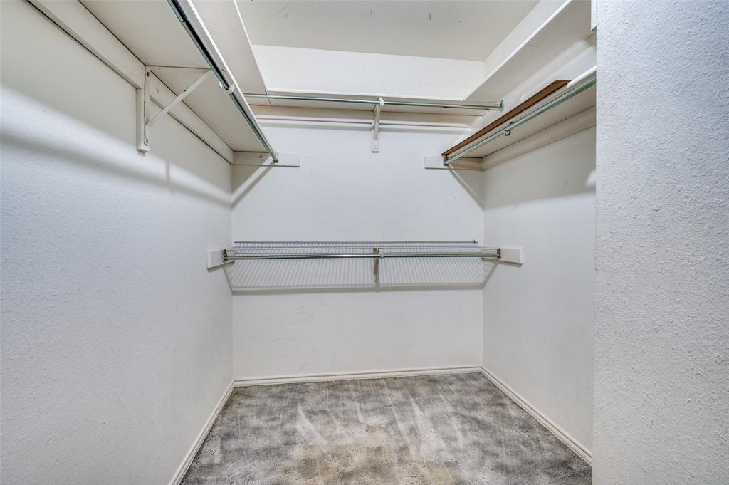 508 South Pedigo Street Pilot Point, TX 76258 - Photo 13 of 25 a view of a room with racks on the wall