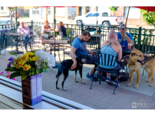 a view of a chairs and tables in the patio