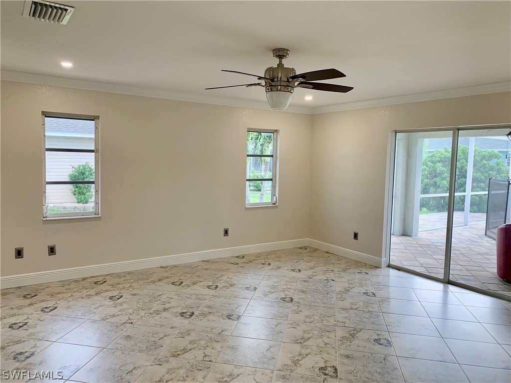 18246 Sycamore Road Fort Myers, FL 33967 - Photo 23 of 35 a view of an empty room with a window