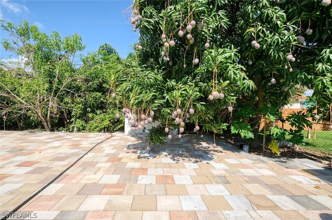 18246 Sycamore Road Fort Myers, FL 33967 - Photo 31 of 35 a view of a pathway with a yard